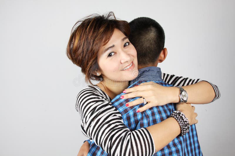 Hug stock image. Image of asian, people, living, friend 17521755