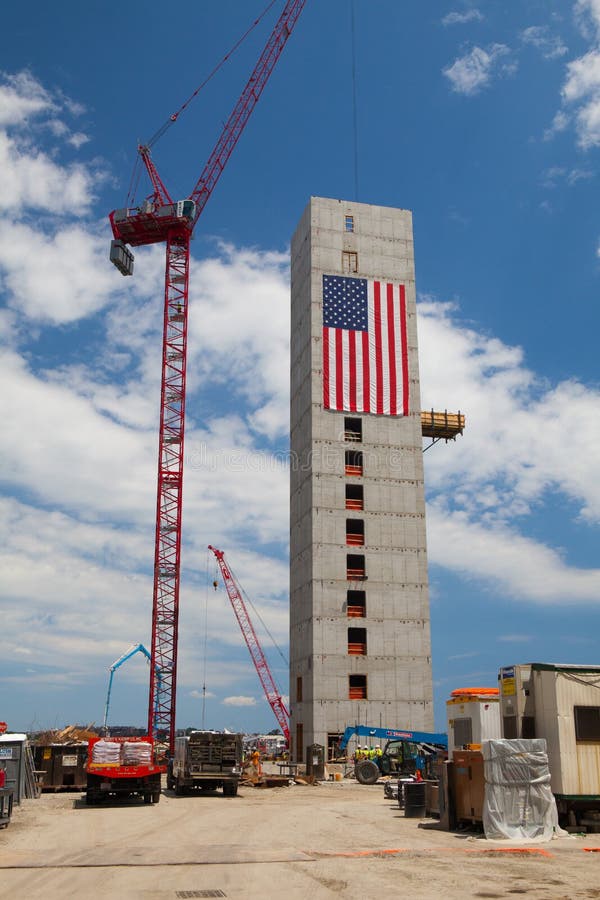 Huge American flag adorns buildings under construction along Harborwalk in Boston