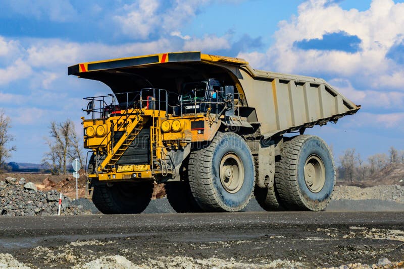 Huge Empty Dump Truck on a Gravel Road in Iron Ore Quarry Stock Image ...