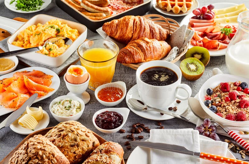 huge-healthy-breakfast-spread-table-huge-healthy-breakfast-spread-table-coffee-orange-juice-t-muesli-smoked-salmon-103997239.jpg