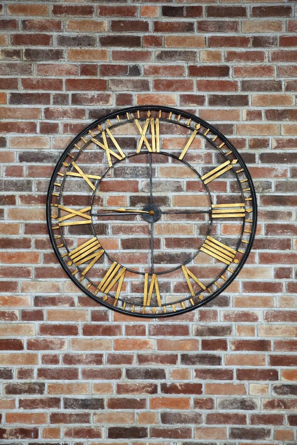 Huge Iron Clock On Brick Wall Stock Photo - Image of construction