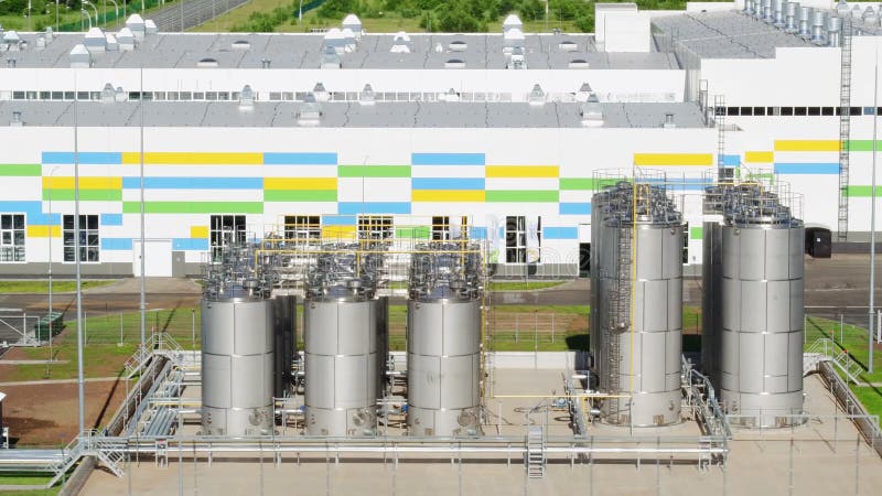 Metal tanks near fertilizer production plant upper view