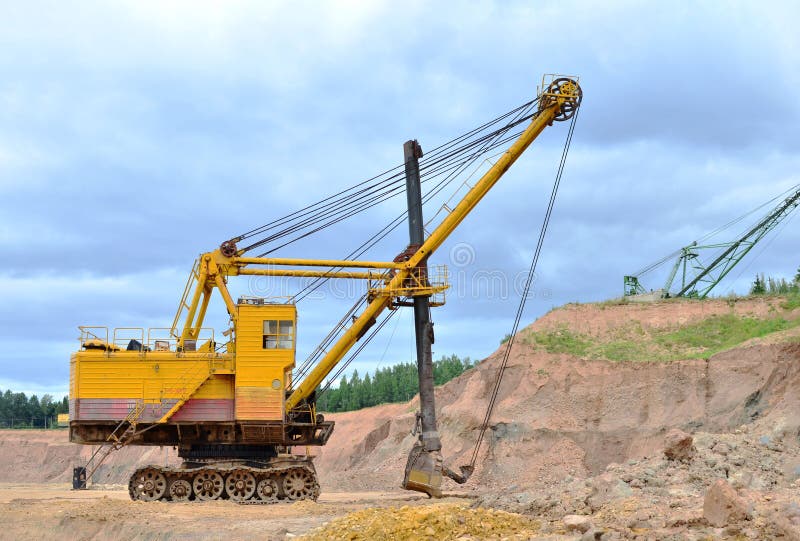 Huge mining excavator in the limestone open-pit. stock photography