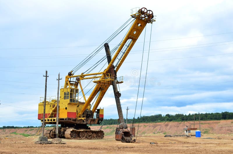 Huge mining excavator in the limestone open-pit. royalty free stock photos