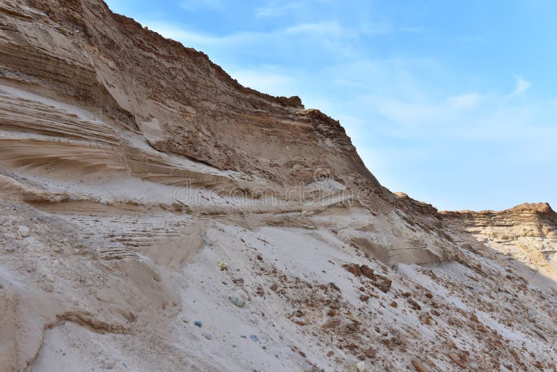 Huge mining excavator in the sand open-pit. Biggest digger working in quarry. Largest tracked machine with electric shovel. Heavy stock photo
