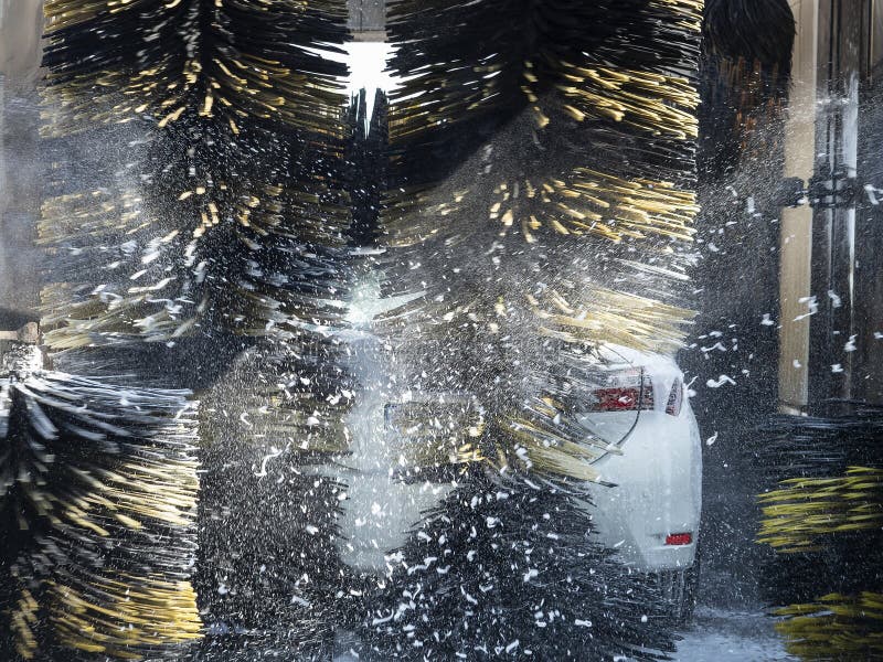 Huge Rotating Brushes that Wash the Car with Soapy Foam. Car Wash
