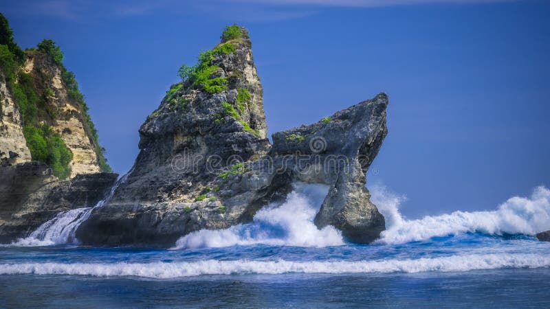 Huge Wave hitting the Rock in the ocean at Atuh beach on Nusa Penida island, Indonesia