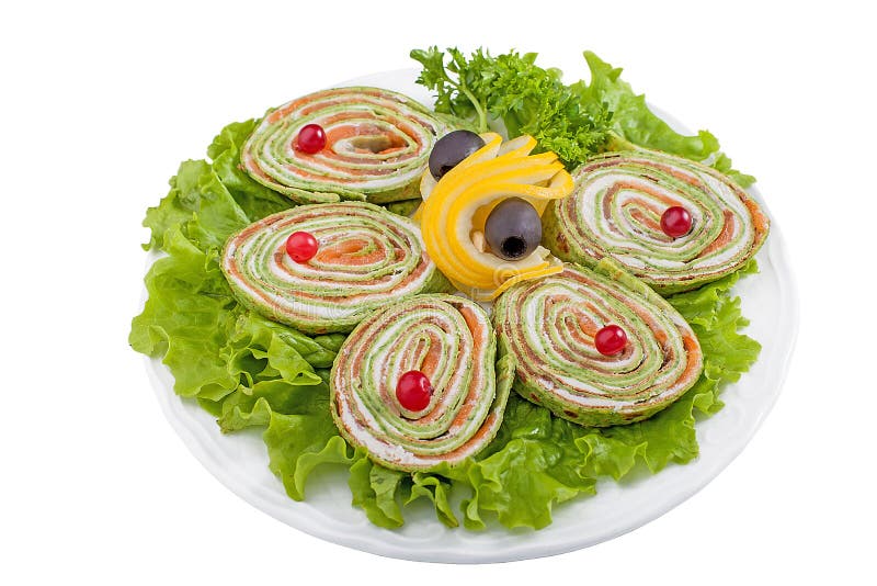 Huggen av spenatroulade med keso royaltyfri bild Huggen av spenatroulade med keso royaltyfri bild