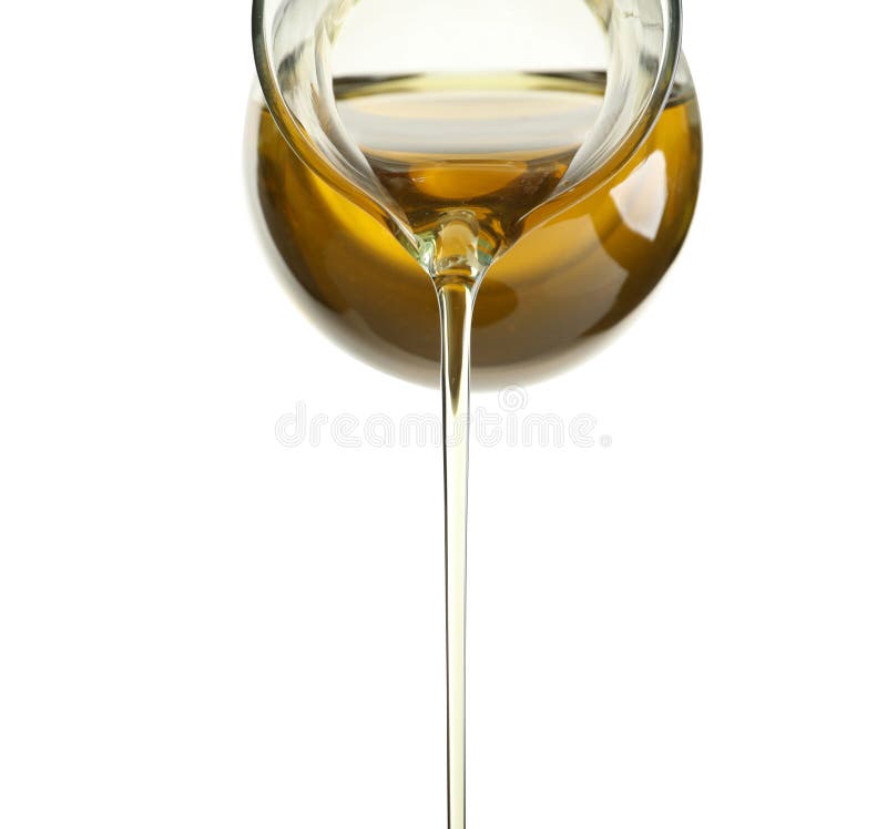 Huile d'olive fraîche se renversante images stock Huile d'olive fraîche se renversante images stock