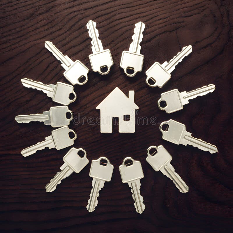 House keys arranged on table, symbolizing real estate concepts For Social Media Post Size. House keys arranged on table, symbolizing real estate concepts For Social Media Post Size