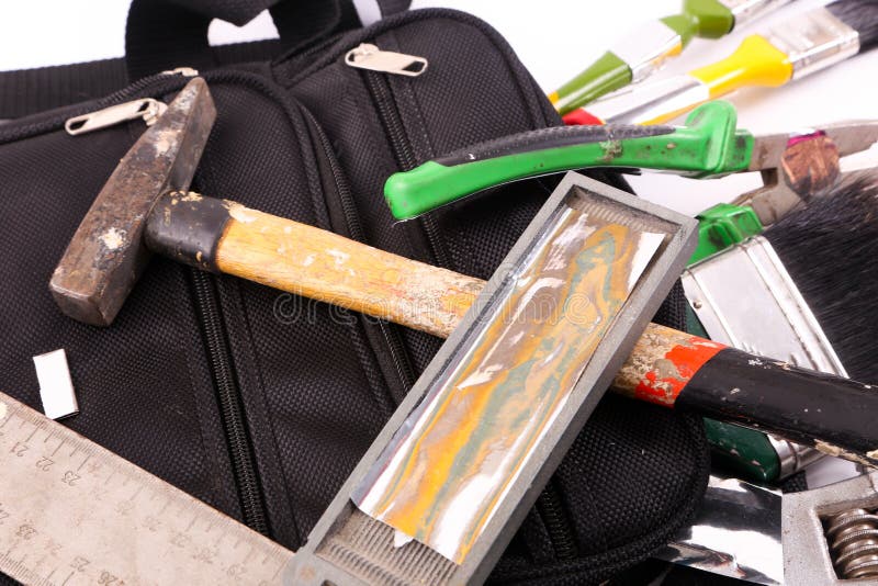 Hulpmiddelen in Zwarte zak stock foto's