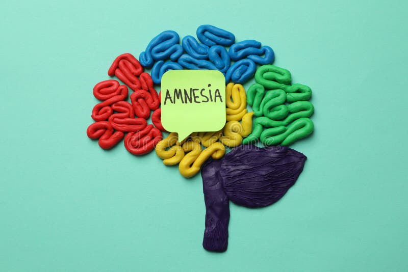 Human brain made of colorful plasticine and paper note with word Amnesia on turquoise background, flat lay