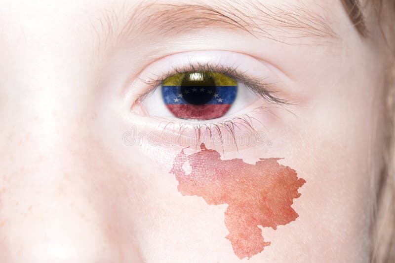 Human& x27; cara de s con la bandera nacional y el mapa de Venezuela imágenes de archivo libres de regalías Human& x27; cara de s con la bandera nacional y el mapa de Venezuela imágenes de archivo libres de regalías