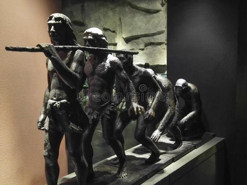 Human evolution copper sculpture