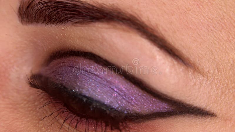 Female eye with fancy makeup, closeup Stock Photo