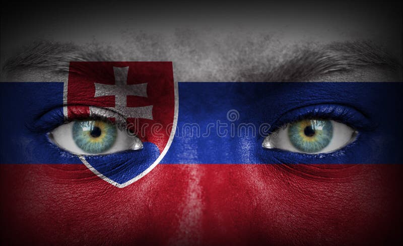 Human face painted with flag of Slovakia