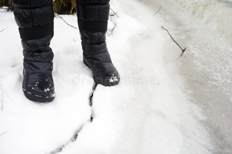 Standing on cracked ice stock photo. Image of weather - 169295628