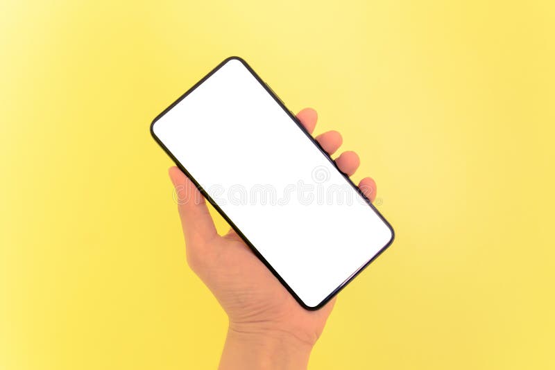 Human hand holding smartphone with white screen background royalty free stock photo Human hand holding smartphone with white screen background royalty free stock photo