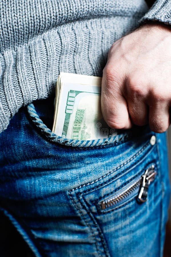 Human Hand is Putting Money in the Pocket Stock Photo - Image of ...