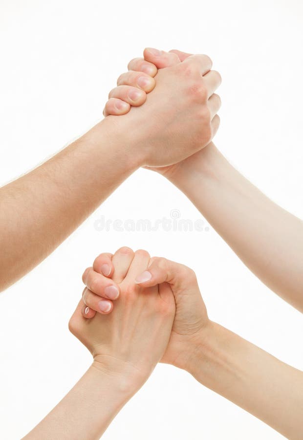 Human hands demonstrating a gesture of a strife or solidarity