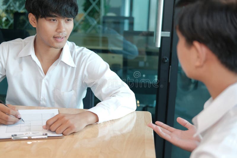 Human resource manager interviewing candidate for job vacancy. applicant explain profile for career recruitment royalty free stock photography