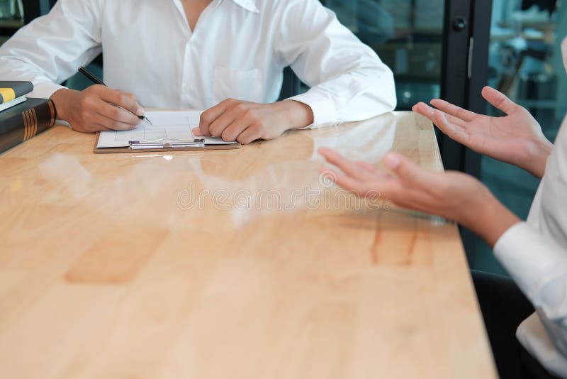 Human resource manager interviewing candidate for job vacancy. applicant explain profile for career recruitment royalty free stock image