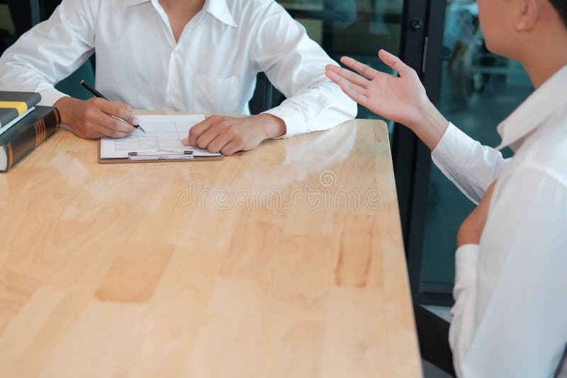 Human resource manager interviewing candidate for job vacancy. applicant explain profile for career recruitment royalty free stock images