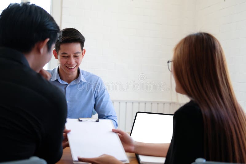 Human resource team interviewing candidate for job vacancy. applicant explaining profile for career recruitment royalty free stock photo