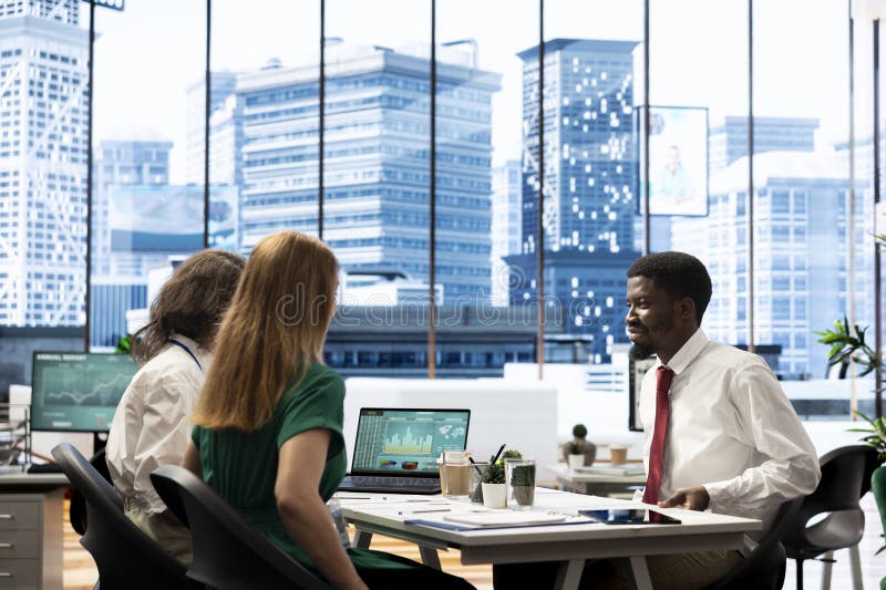 Human resources team talking with applicant for financial market career stock photography