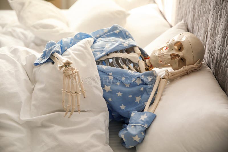 human-skeleton-pajamas-lying-bed-human-skeleton-pajamas-lying-bed-indoors-170324566.jpg