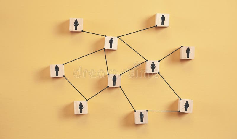 Human social network. Human figures on wooden cubes royalty free stock photo