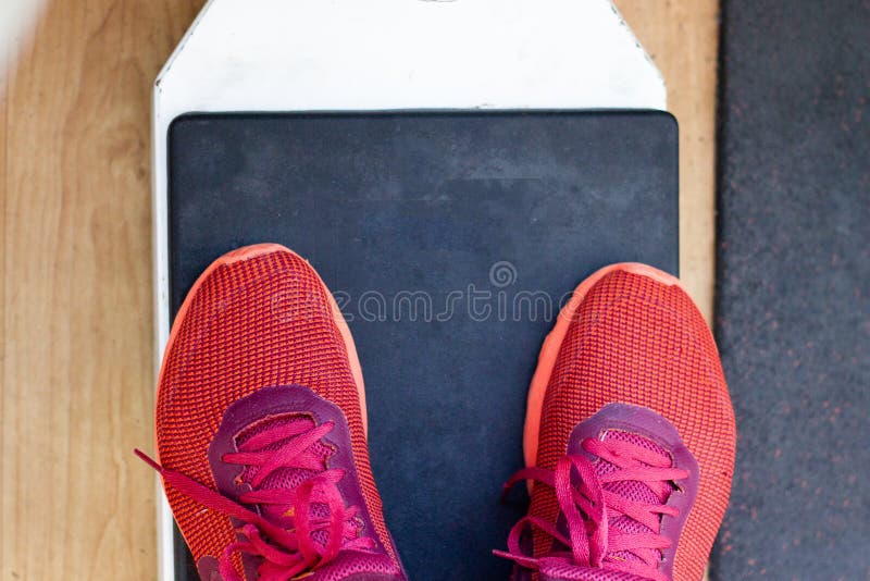 Human weighing machine stock photo. Image of obesity 174251466