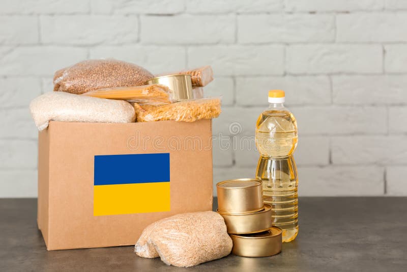 Humanitarian Aid for Ukrainian Refugees. Donation Box with Food on