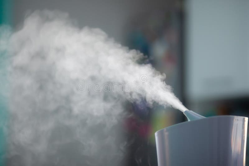 Humidifier spreading steam stock photos