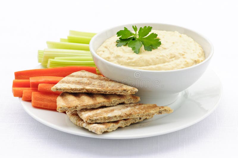 Hummus met pitabroodje en groenten royalty-vrije stock foto's Hummus met pitabroodje en groenten royalty-vrije stock foto's