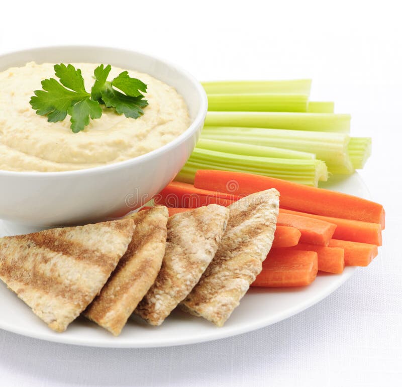 Hummus met pitabroodje en groenten stock afbeelding Hummus met pitabroodje en groenten stock afbeelding