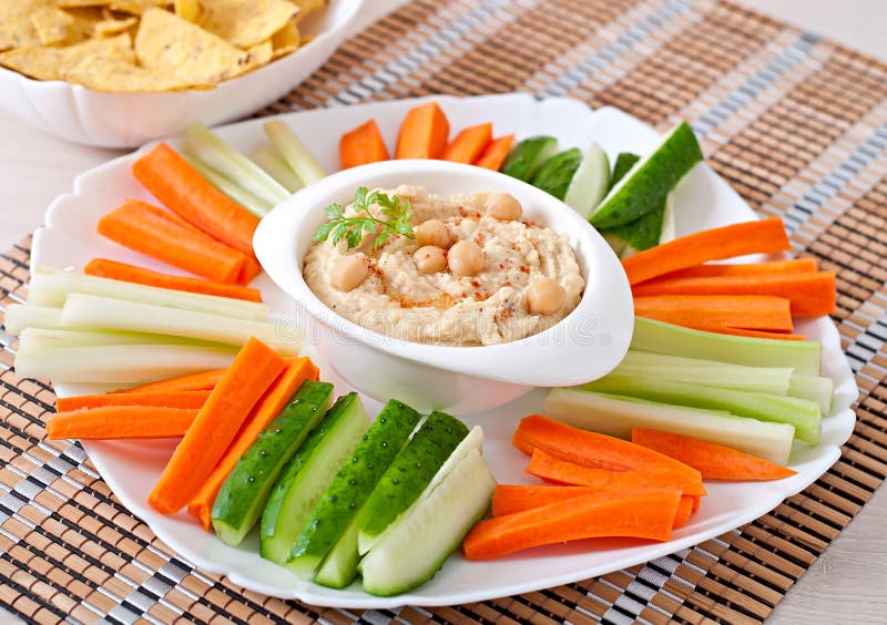 Hummus with Vegetables, Olive Oil and Pita Chips Stock Image Image of