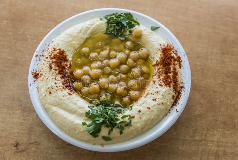 Hummus с оливковым маслом стоковые изображения Hummus с оливковым маслом стоковые изображения