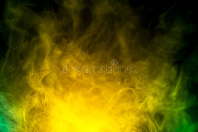 Humo amarillo y verde imagen de archivo