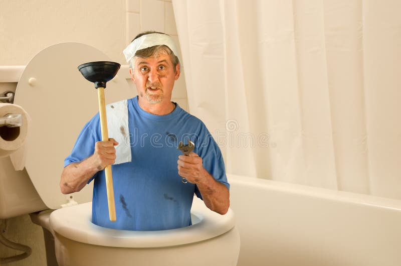Humorous funny plumber inside toilet with tools and toilet paper