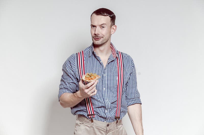 Hungry Bavarian man eating sandwich stock photos