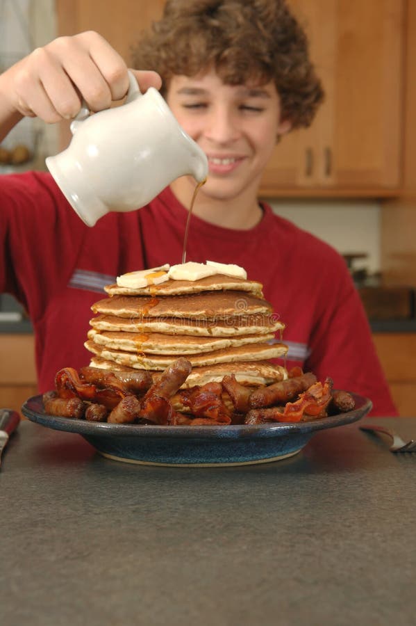 Hungry boy stock image. Image of funny, syrup, bacon, extreme 3491621