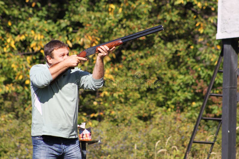 Hunter editorial photo. Image of jacket, trees, grass 26818311