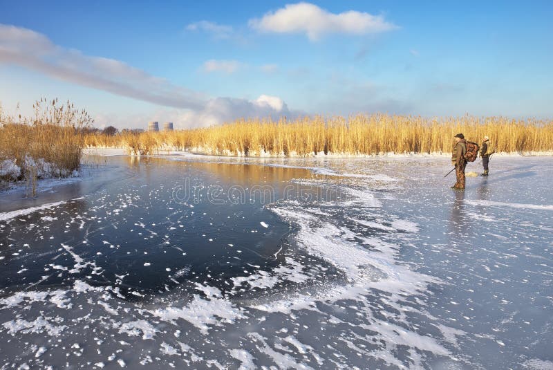 Hunters on the ice pond waiting victim. royalty free stock photos Hunters on the ice pond waiting victim. royalty free stock photos