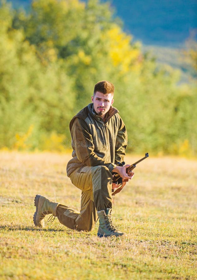 Hunting Shooting Trophy. Hunter with Rifle Looking for Animal. Hunting As  Male Hobby and Leisure Stock Photo - Image of mountains, beard: 141863886