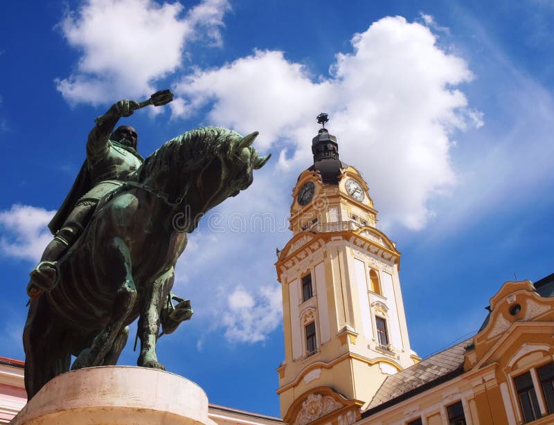 Hunyadi statue and Clock Tower, Pécs, Hungary royalty free stock photography Hunyadi statue and Clock Tower, Pécs, Hungary royalty free stock photography