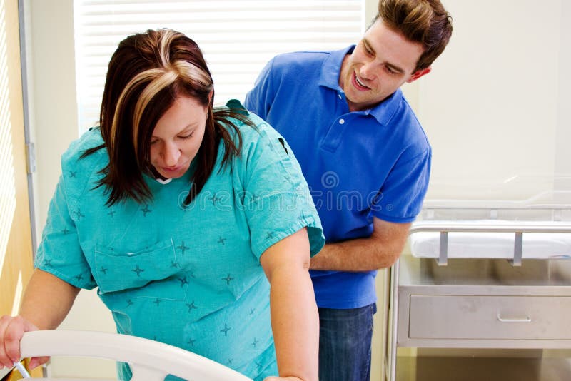 Husband checking in with wife in labor