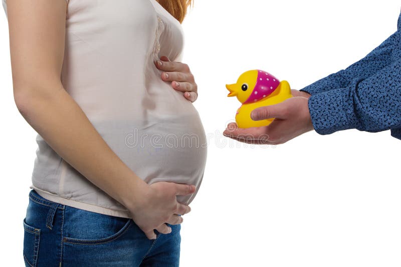 Husband Holding Toy Duck and His Pregnant Wife Stock Image