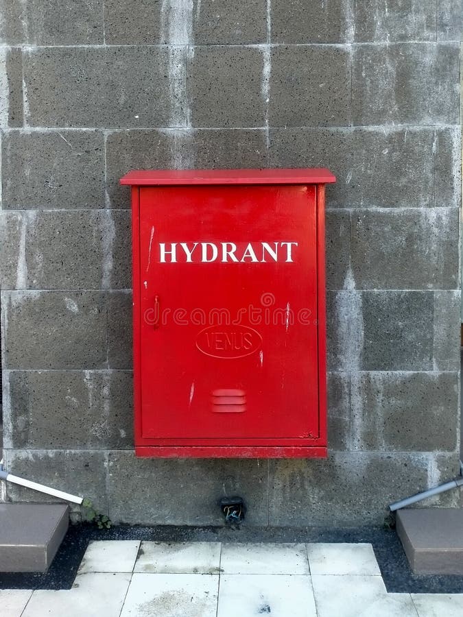 Hydrant hose box on the wall stock photo