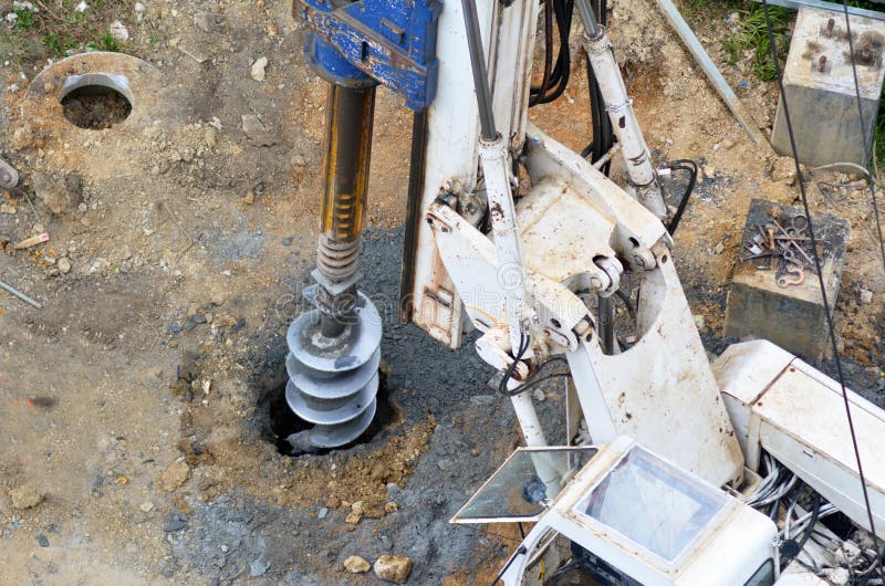 Hydraulic Hammer Drilling Machine at Construction Site Stock Photo